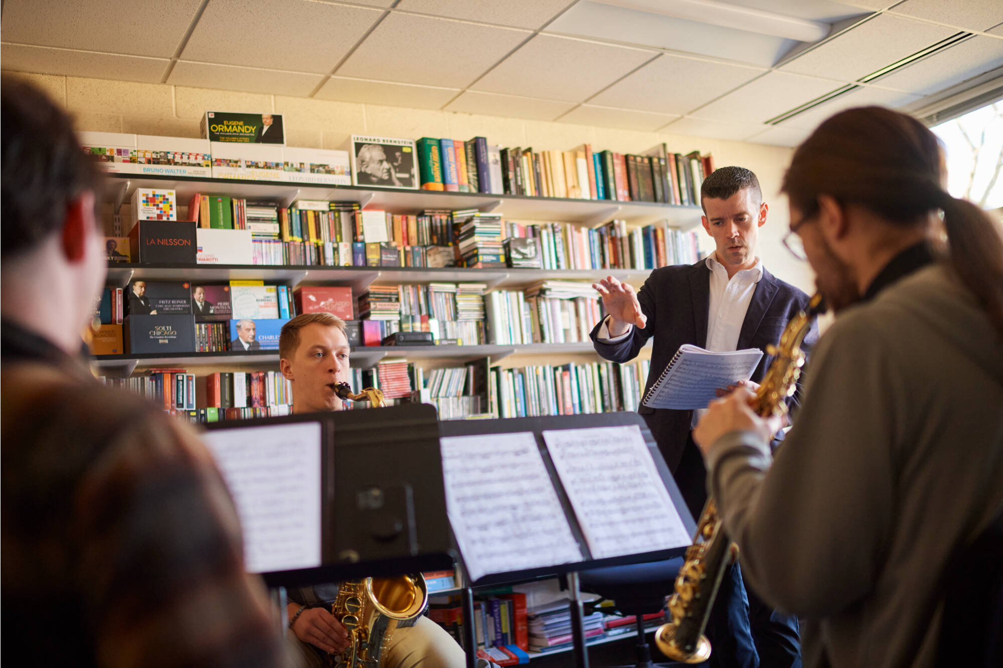 A GVSU music professor with students.
